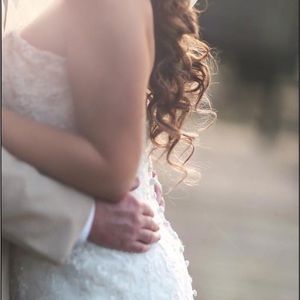 Allure wedding dress.Payed $1400 selling for $300. Wristlet added to train